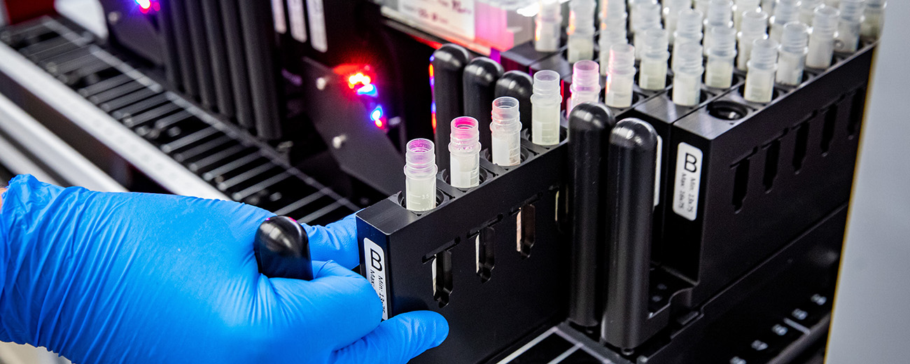 close up of covid test processing in lab