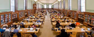 Students study in the Main Stacks in Urbana-Champaign